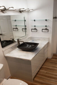 New vanity, toilet, and floor after bathroom remodel in Honolulu